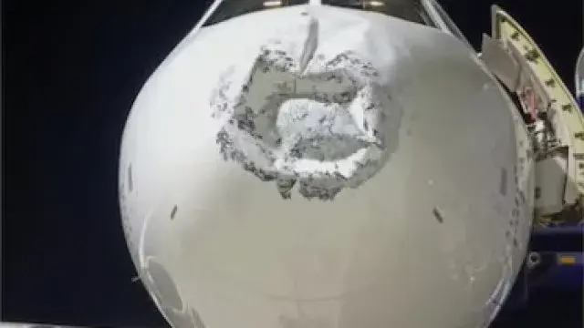 Lightning strikes while in the air, damaging the nose of an IndiGo plane